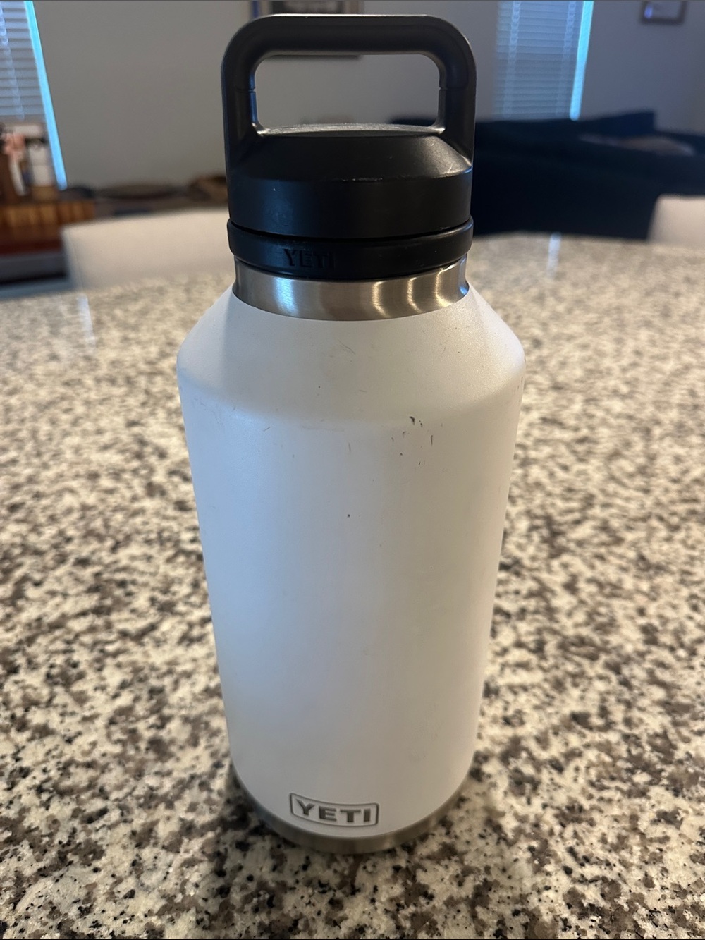 Yeti White Bottle with Black Handle and Stainless Rim